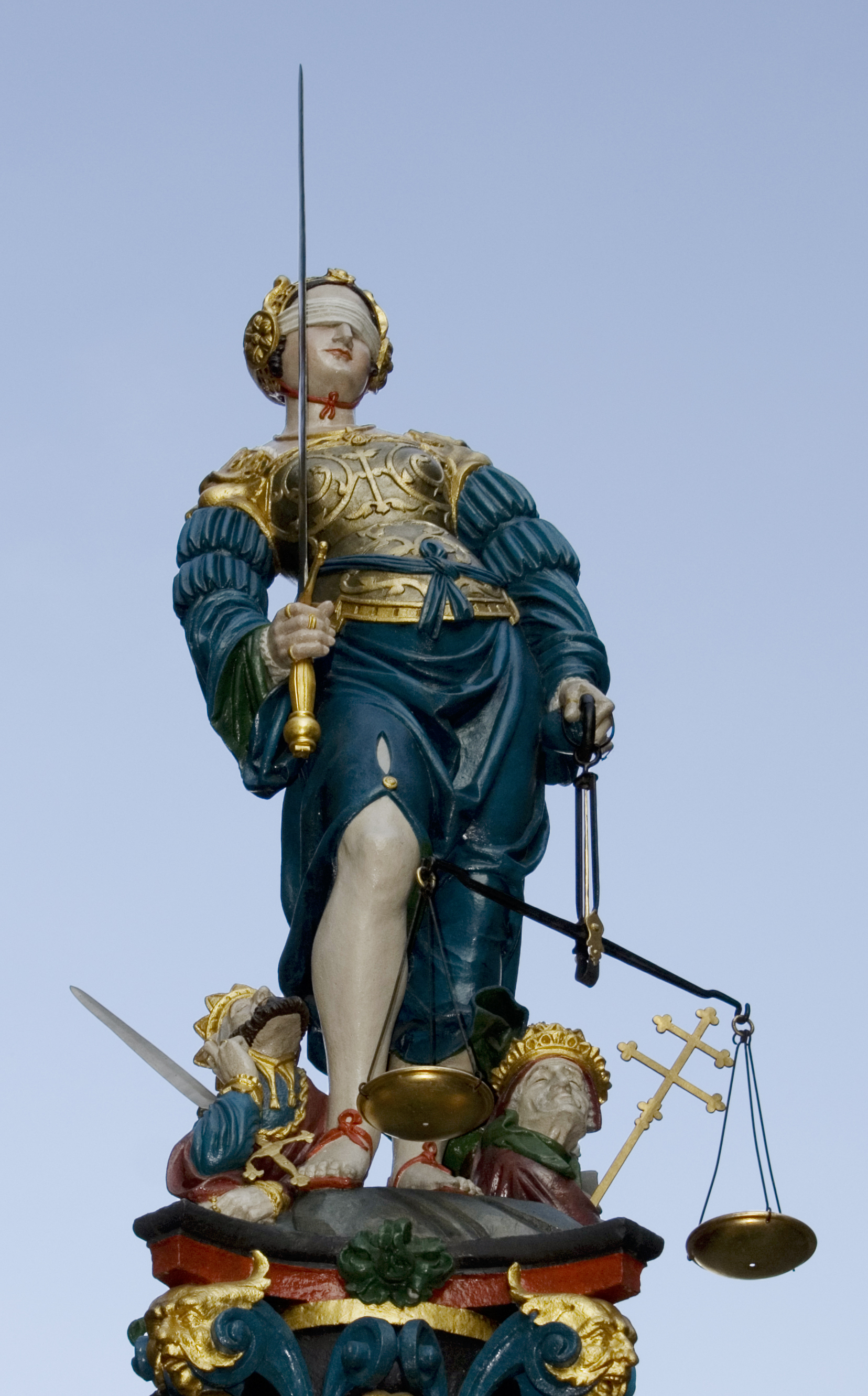 The Justitia fountain statue in Bern — blindfolded with sword and scales