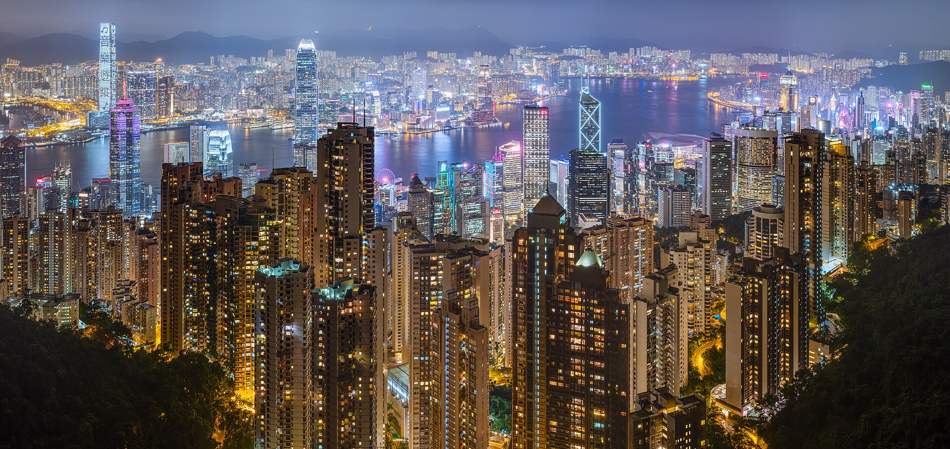 Victoria Harbour and the Hong Kong skyline at night